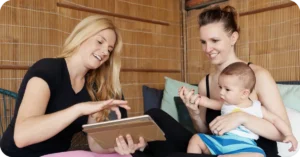 women-entertaining-little-boy